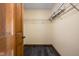 This walk-in closet has a wire shelving system and dark vinyl floors at 504 Countryside Dr, Lebanon, IN 46052
