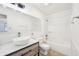 Bright bathroom featuring modern vanity, white walls, and bathtub at 5323 Shefford Ct, Indianapolis, IN 46254