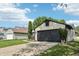 Single-Gathering home featuring a two-car garage, porch, and landscaping at 5323 Shefford Ct, Indianapolis, IN 46254