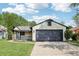 Charming single-Gathering home with a spacious two-car garage and well-maintained lawn at 5323 Shefford Ct, Indianapolis, IN 46254