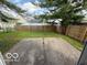 Features a concrete patio in a fenced yard at 5327 Traditions Dr, Indianapolis, IN 46235