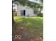A lush green lawn in a fenced backyard at 5327 Traditions Dr, Indianapolis, IN 46235