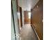 Hallway featuring neutral paint and carpet at 5327 Traditions Dr, Indianapolis, IN 46235