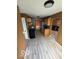 Features stainless steel appliances, light wood cabinets, and updated flooring at 5327 Traditions Dr, Indianapolis, IN 46235