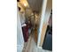 Laundry room features updated machines, shelving, and updated flooring at 5327 Traditions Dr, Indianapolis, IN 46235