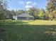 A home with a manicured lawn and a hot tub in the backyard at 5607 E 500 N, Greenfield, IN 46140