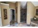 Bathroom with neutral colored walls, walk-in shower, and a closet at 5607 E 500 N, Greenfield, IN 46140