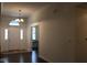 Open entryway with white trim, lots of natural light, and views to additional living spaces at 5607 E 500 N, Greenfield, IN 46140