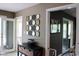 Hallway space with views to the backyard, including an interesting wall art piece at 5607 E 500 N, Greenfield, IN 46140