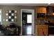 Open eat-in kitchen with stainless steel appliances, granite countertops, and adjacent dining area at 5607 E 500 N, Greenfield, IN 46140