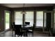 Inviting kitchen nook with natural light, a round table, and views of the outdoors at 5607 E 500 N, Greenfield, IN 46140