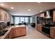 Open kitchen layout with stainless appliances, tile backsplash, and adjacent dining area, perfect for entertaining at 5607 E 500 N, Greenfield, IN 46140