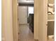 This laundry room features a sink, tile floor, and full size washer and dryer at 5607 E 500 N, Greenfield, IN 46140