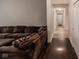 Living room featuring hardwood floors and a view into the front hallway at 5607 E 500 N, Greenfield, IN 46140