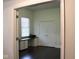 This home office features a window, built-in desk, and closet at 5607 E 500 N, Greenfield, IN 46140