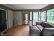 Sunroom featuring tile floors and view to the backyard at 5607 E 500 N, Greenfield, IN 46140