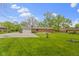 Brick home exterior with a spacious driveway and large grassy backyard at 5846 Linton Ln, Indianapolis, IN 46220