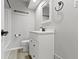 Charming bathroom with white vanity, framed mirror, and modern fixtures at 5846 Linton Ln, Indianapolis, IN 46220