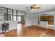 Spacious living room with hardwood floors seamlessly connected to the kitchen at 5846 Linton Ln, Indianapolis, IN 46220