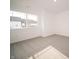 Bright bedroom featuring a large window and neutral carpet at 6216 Cascades Dr, Whitestown, IN 46075