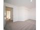 Neutral bedroom featuring a closet, carpet and a large opening to another room at 6216 Cascades Dr, Whitestown, IN 46075