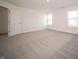 Spacious bedroom with neutral carpet and natural light at 6216 Cascades Dr, Whitestown, IN 46075