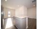 Open-concept kitchen with center island flowing into the living spaces at 6216 Cascades Dr, Whitestown, IN 46075