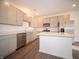 Well-lit kitchen with stainless steel appliances and a large center island at 6216 Cascades Dr, Whitestown, IN 46075