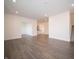 Spacious living room offering a view into the kitchen and staircase access at 6216 Cascades Dr, Whitestown, IN 46075