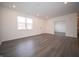 Bright, open-plan living area with a neutral palette and modern flooring at 6216 Cascades Dr, Whitestown, IN 46075