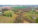 Overhead view of the property showing open land and structures at 647 N 100 W, Franklin, IN 46131