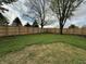 Scenic fenced yard with a freshly installed wood privacy fence and well maintained lawn at 647 N 100 W, Franklin, IN 46131
