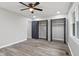 This bright bedroom features light gray walls and a large window for natural light at 647 N 100 W, Franklin, IN 46131