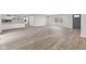 Spacious living room featuring modern wood flooring and neutral paint scheme for a bright and airy feel at 647 N 100 W, Franklin, IN 46131