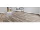 Bright living room with modern gray walls and attractive, durable flooring at 647 N 100 W, Franklin, IN 46131