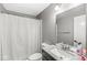 A bathroom featuring a vanity, mirror, shower/tub, and toilet; perfect for convenience at 6758 Woodcliff Cir, Zionsville, IN 46077