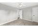 Bright room featuring neutral walls, ceiling fan and carpet creating a welcoming atmosphere at 6758 Woodcliff Cir, Zionsville, IN 46077