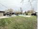 Spacious backyard with in-ground pool, gazebo, and well-manicured lawn, great for outdoor living at 6811 S Meridian St, Indianapolis, IN 46217