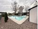 Inviting in-ground pool surrounded by lush landscaping, a gazebo, and ample space for relaxation at 6811 S Meridian St, Indianapolis, IN 46217