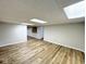 Large finished basement area with neutral walls and modern flooring at 6811 S Meridian St, Indianapolis, IN 46217