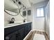 Modern bathroom with a double vanity, black hardware, and stylish lighting at 6811 S Meridian St, Indianapolis, IN 46217