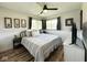 Cozy bedroom with natural light, featuring a neutral color palette and wood-look flooring at 6811 S Meridian St, Indianapolis, IN 46217