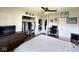 Bedroom featuring closet space, a modern ceiling fan and a work desk at 6811 S Meridian St, Indianapolis, IN 46217