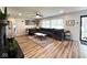 Comfortable living room features a large sectional sofa, area rug, and lots of natural light at 6811 S Meridian St, Indianapolis, IN 46217