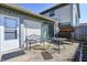 Private backyard patio area, complete with seating and outdoor dining at 6814 Summer Time Dr, Indianapolis, IN 46226