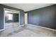 Spacious carpeted bedroom with mirrored closet at 6814 Summer Time Dr, Indianapolis, IN 46226