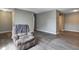 Spacious living room with open layout and neutral walls at 6814 Summer Time Dr, Indianapolis, IN 46226