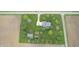 Wide aerial shot of a blue home with a large yard, detached garage and surrounding fields at 7020 N 375 E, Lebanon, IN 46052
