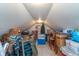 Unfinished attic space providing ample storage potential with lots of boxes and containers at 7020 N 375 E, Lebanon, IN 46052