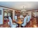 Traditional dining room with hardwood floors, a chandelier, and seating for eight at 7020 N 375 E, Lebanon, IN 46052